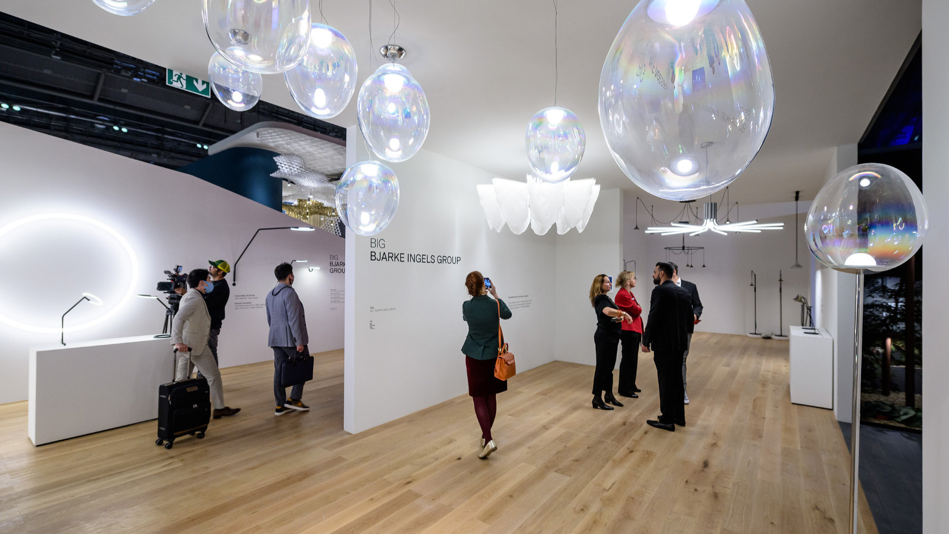 Beautiful hand-crafted luminaires seem to float in the room like shimmering soap bubbles